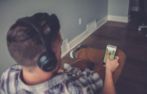 A man listening to an audiobook